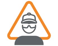 Oranžs trijstūris ar personas ikonu, kas valkā drošības cepuri un brilles