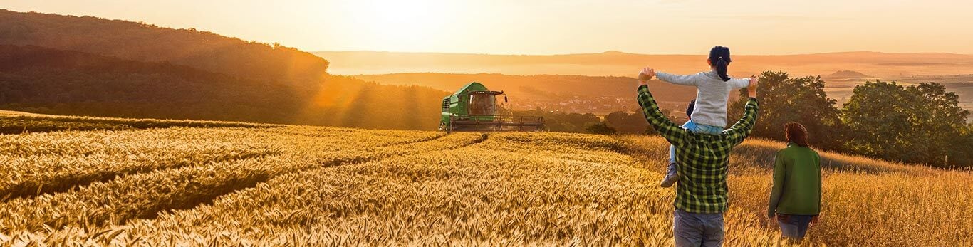 John Deere Financial saime kviešu laukā