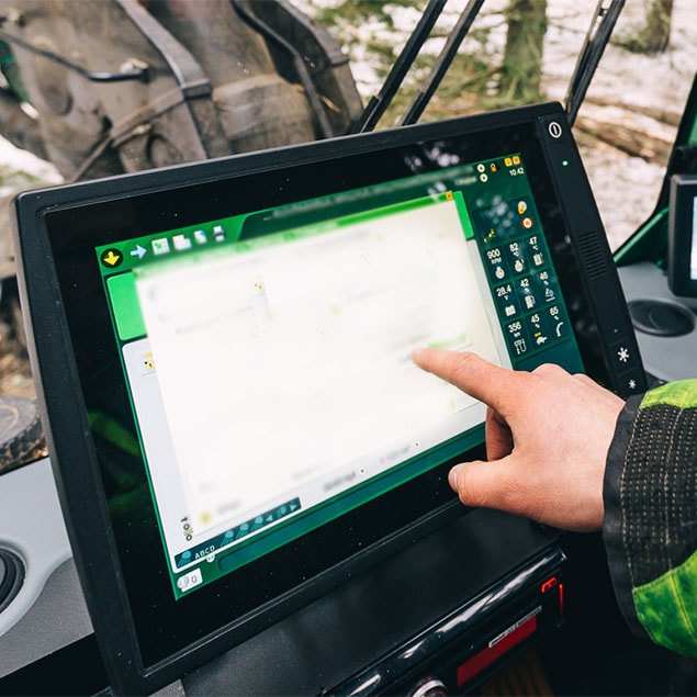 John Deere meža tehnikas kabīne
