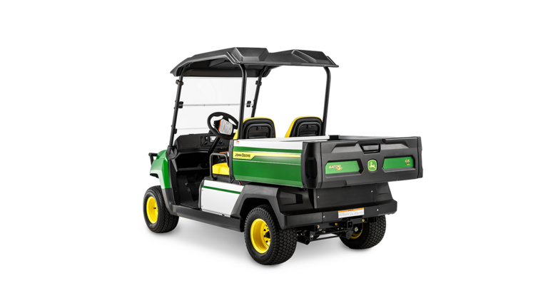 John Deere Gator GS benzīna modeļa skats no aizmugures leņķa, kurā redzama kravas kaste, divi sēdekļi un jumta aizsargpārsegs.