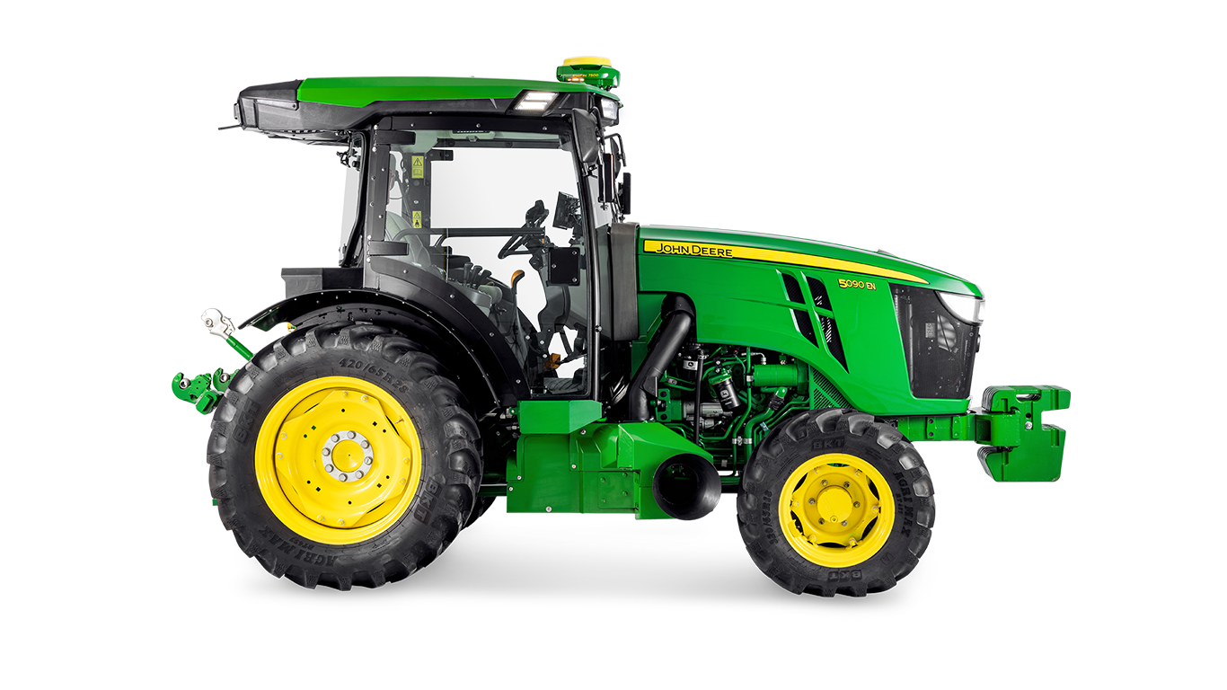 John Deere 5090EN traktora sānu profils, kurā izceļas kabīnes dizains un lielās aizmugurējās riepas.